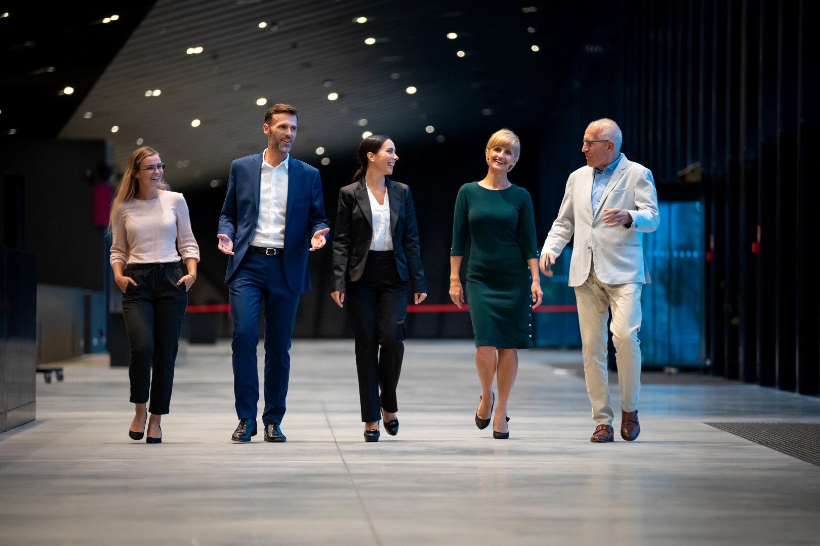 diverse-group-of-business-people-of-all-ages-walki-2024-10-31-00-40-58-utc (Custom)-1